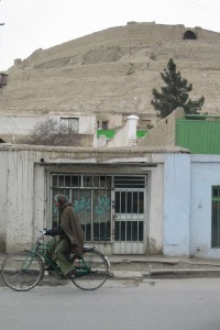 Biking in front of Kabul's old citadel (February 2002).