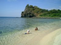 Cooling off at one of Maricaban's beaches.