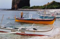 Picnicers' bankas at Cemetery Beach, Maricaban Island.