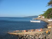 Sunny day at Tamarind Beach - Tagaytay Ridge in the far end.