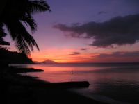 The day's last ray's colors the sky purple over Mount Kalawite in Mindoro.
