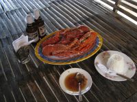 Fresh seafood grilled on the beach.
