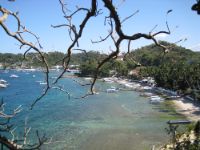 Small Lalaguna beach in Puerto Galera and behind it, Sabang Beach.
