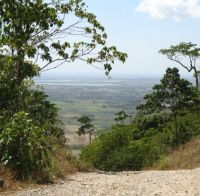 The road on Mindoro's southern end, connecting the eastern and the western roads, is passable only with offroad-capable vehicles. The road ends with a view to the plains outside San Jose City.