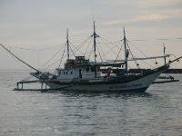 Fishing banka moored outside Mamburao. Mamburao had a sizeable fishing port which looked pretty messy as such ports usually do - no beach promenade with gourmet sea food restaurants!