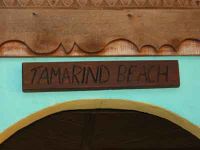 The sign was made from a piece of driftwood.