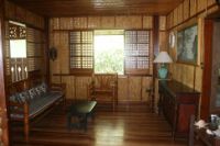 Both inner and outer walls were made of sawali mats (flattened bamboo weaves), however I panelled the external walls after some years.